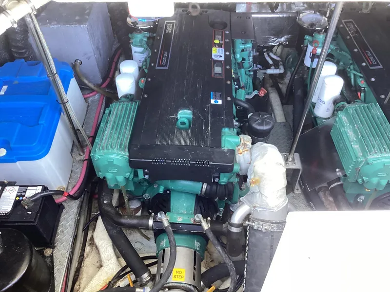 Slide: The Image of Engine compartment of 2007 Regal Commodore 4460 with visible components and wiring. - 47