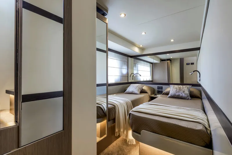 Slide: The Image of Luxurious twin bedroom in the 2025 Absolute 48 Navetta yacht. - 15