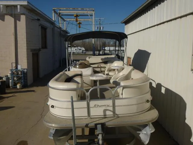 Slide: The Image of 2005 Sun Tracker Party Barge 27 I/O pontoon boat with canopy in storage area. - 4