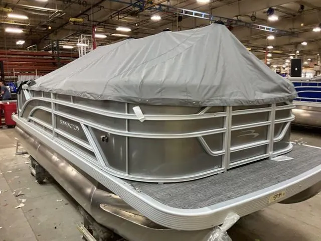 Slide: The Image of 2025 Bennington 188 SL Pontoon with L Bench seating and table. - 13
