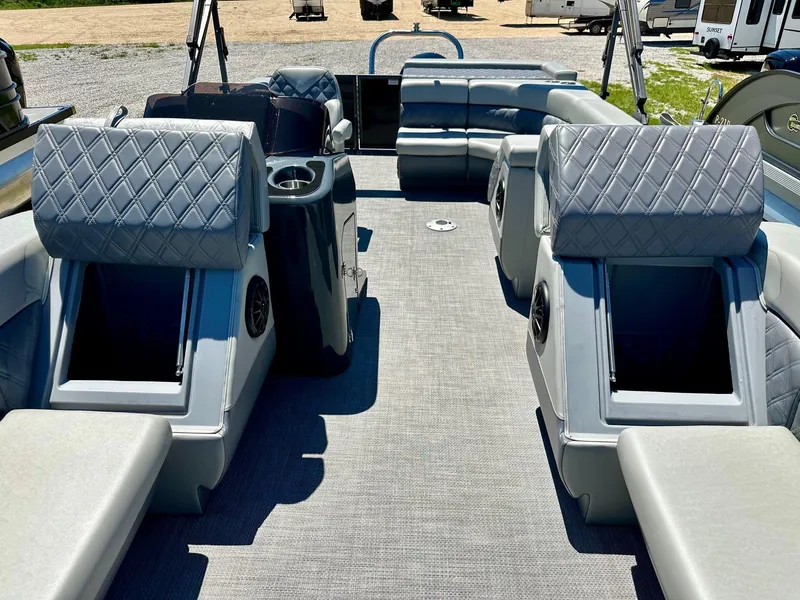 Slide: The Image of 2024 Massimo Marine P24-Limited Max pontoon boat interior with luxurious seating. - 10