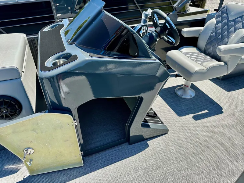 Slide: The Image of 2024 Massimo Marine P24-Limited Max boat console and captain's chair. - 11