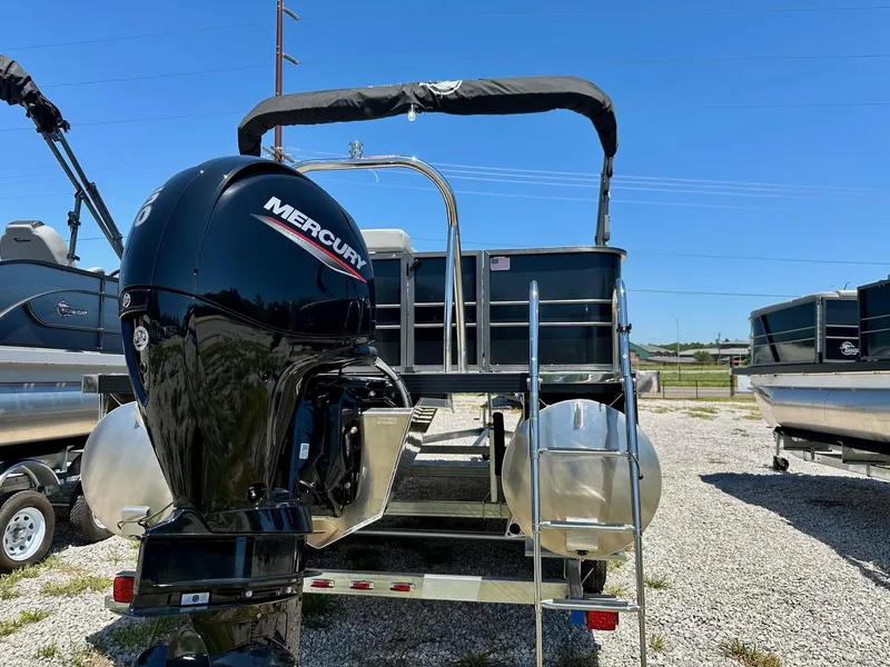 Slide: The Image of 2024 Massimo Marine P24-Limited Max pontoon boat with Mercury outboard motor. - 4