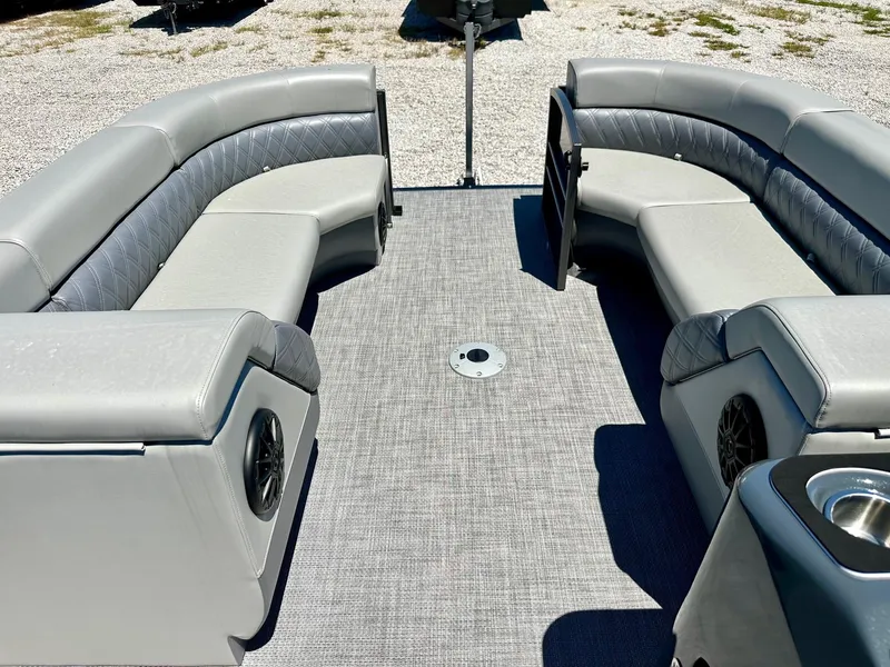 Slide: The Image of 2024 Massimo Marine P24-Limited Max pontoon boat with spacious seating and modern design. - 9