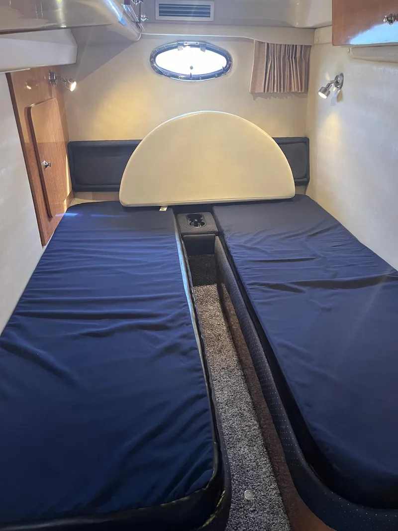 Slide: The Image of 2003 Regal Commodore 3860 cabin interior with twin beds. - 20