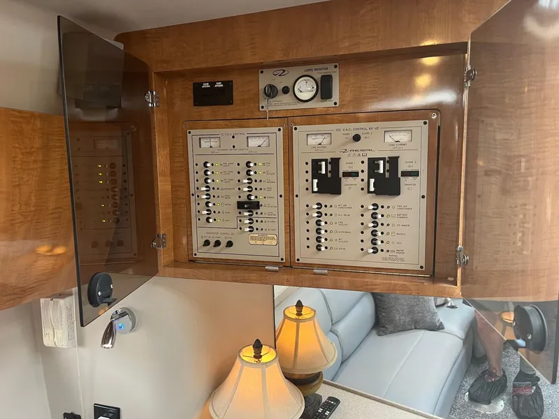 Slide: The Image of Electrical control panel inside a 2003 Regal Commodore 3860 yacht. - 28