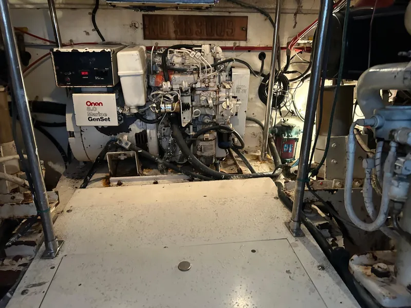 Slide: The Image of Engine room of a 1990 Egg Harbor 42 Golden Egg with Onan 8.0 Marine GenSet. - 17