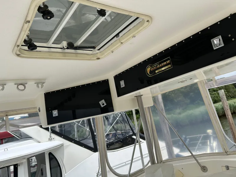 Slide: The Image of Interior view of a 1990 Egg Harbor 42 Golden Egg yacht with skylight and branding. - 27