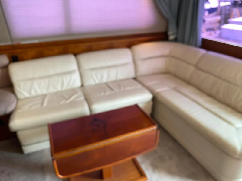 Slide: The Image of Luxurious interior of 1990 Egg Harbor 42 Golden Egg yacht with cream leather seating. - 3