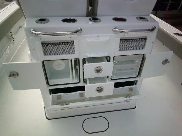 Slide: The Image of 2024 Sportsman 267OE boat storage compartments and drawers. - 22