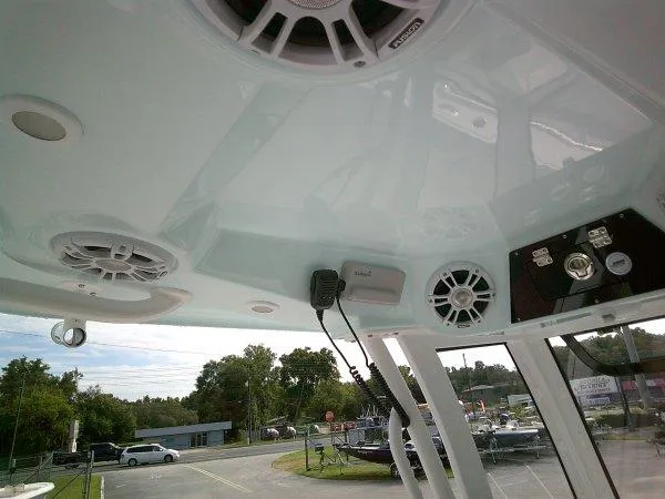 Slide: The Image of 2024 Sportsman 267OE boat interior with speakers and control panel. - 5