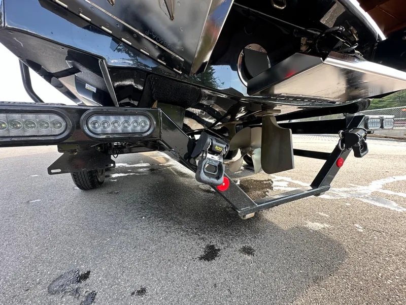 Slide: The Image of 2023 MasterCraft NXT 22 boat trailer hitch and propeller close-up. - 15