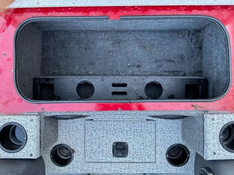 Slide: The Image of 2020 Tracker Pro Team 195 TXW Tournament Edition boat storage compartments and cup holders. - 7