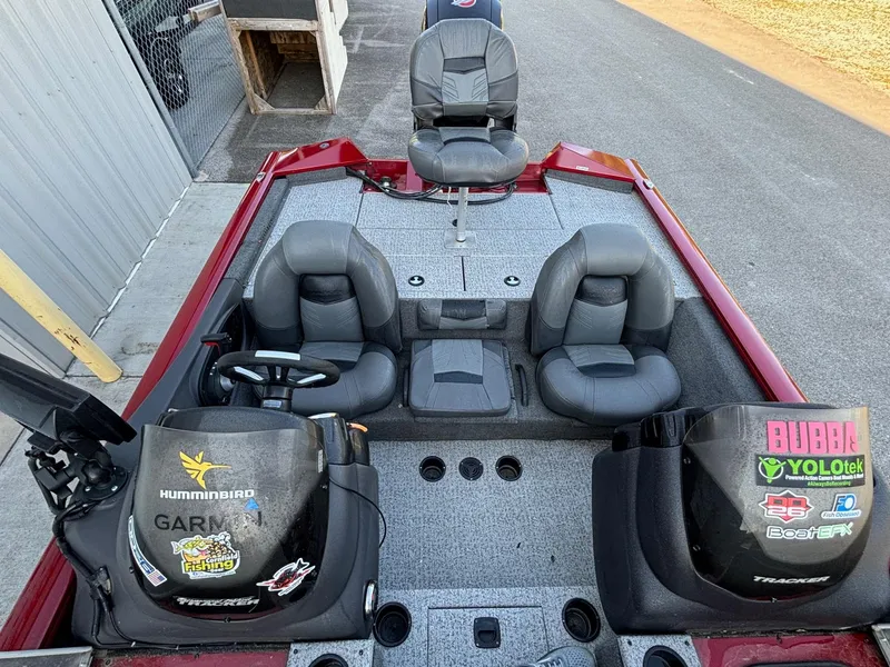 Slide: The Image of 2020 Tracker Pro Team 195 TXW Tournament Edition fishing boat interior with seats and equipment. - 8