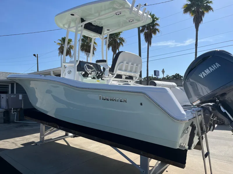 Slide: The Image of 2025 Tidewater 210 CC Adventure boat with Yamaha engine on display. - 12