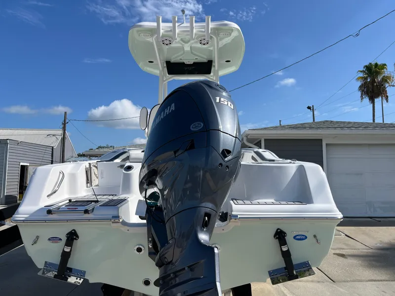 Slide: The Image of 2025 Tidewater 210 CC Adventure boat with Yamaha 150 engine, rear view. - 3