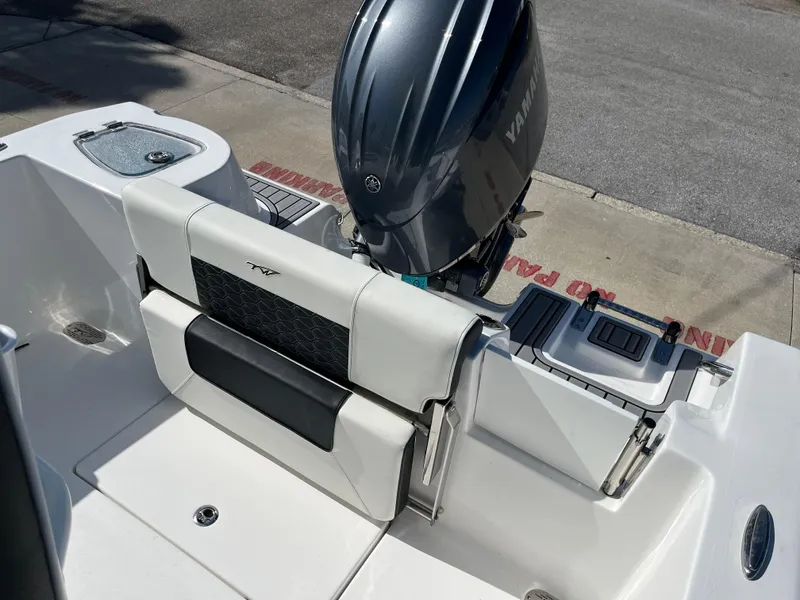 Slide: The Image of 2025 Tidewater 210 CC Adventure boat with Yamaha outboard motor. - 9