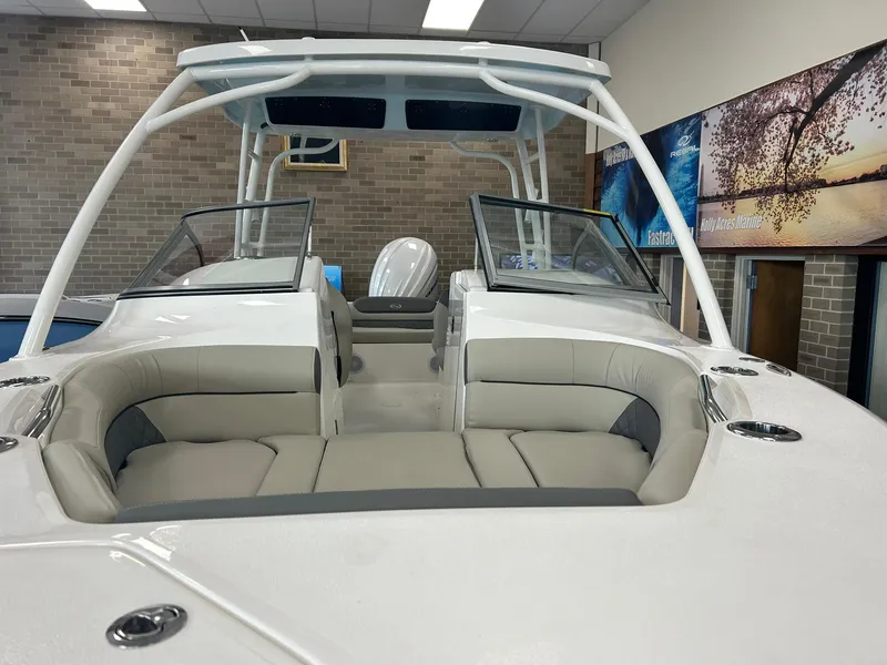 Slide: The Image of 2024 Key West 239 DFS boat interior with seating and windshield. - 3