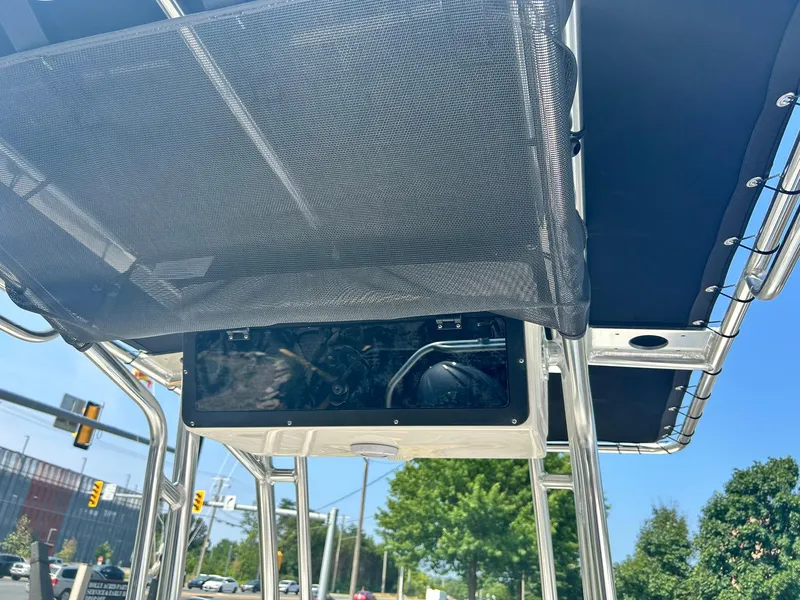 Slide: The Image of 2025 Key West 203 FS boat with T-top and electronics box. - 10