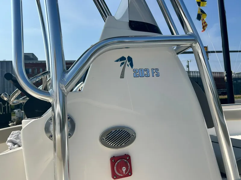 Slide: The Image of 2025 Key West 203 FS boat console with stainless steel railings. - 4