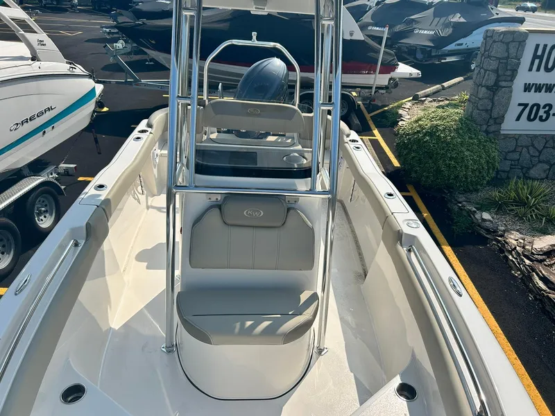Slide: The Image of 2025 Key West 203 FS boat interior with seating and console. - 8