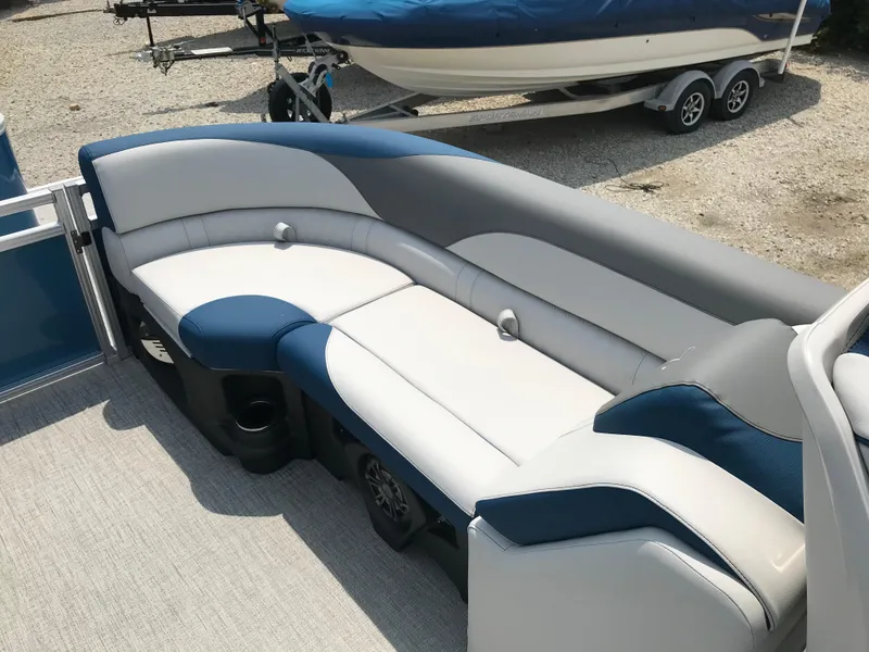 Slide: The Image of 2025 Avalon LSZ Quad Lounger boat interior with wrapped accessories. - 14