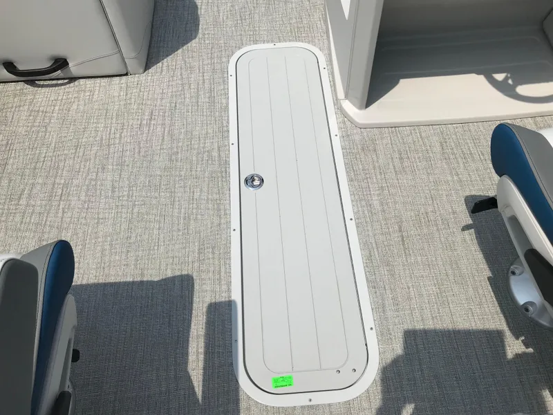 Slide: The Image of 2025 Avalon LSZ Quad Lounger boat interior with seating and storage. - 17