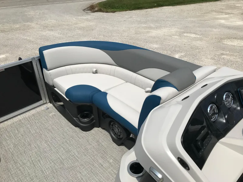 Slide: The Image of 2025 Avalon LSZ Quad Lounger interior with grey flooring and white-blue seating. - 19