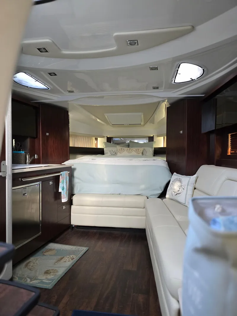 Slide: The Image of Interior of 2021 Monterey 335 Sport Yacht with modern furnishings and elegant design. - 27