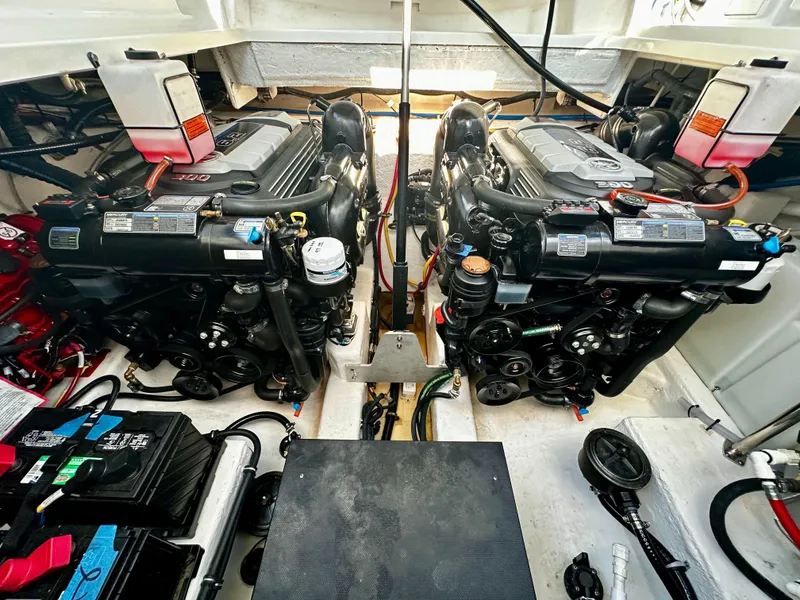 Slide: The Image of Engine room of 2021 Monterey 335 Sport Yacht with dual engines and components. - 33