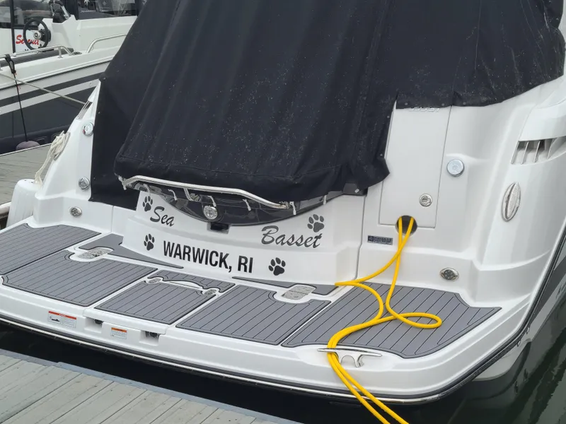 Slide: The Image of 2021 Monterey 335 Sport Yacht docked, featuring "Sea Basset" name and Warwick, RI location. - 42