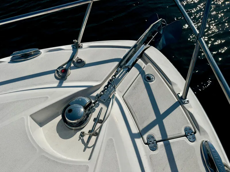 Slide: The Image of Bow of 2021 Monterey 335 Sport Yacht with anchor and railing in sunlight. - 8