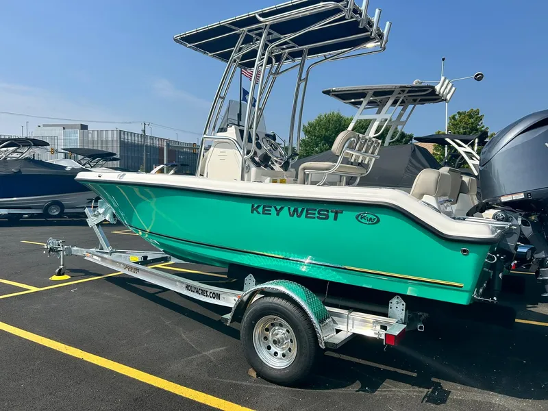 The Image of 2025 Key West 189 FS boat on a trailer in a parking lot. - 0