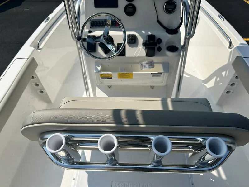 Slide: The Image of 2025 Key West 189 FS boat console with steering wheel and rod holders. - 11