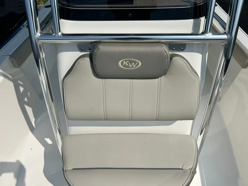 Slide: The Image of 2025 Key West 189 FS boat seat with KW logo and stainless steel frame. - 9
