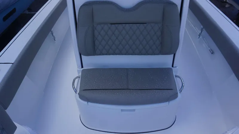 Slide: The Image of Gray cushioned seat on 2025 Sportsman 267 Masters boat, featuring diamond stitching and sleek design. - 14