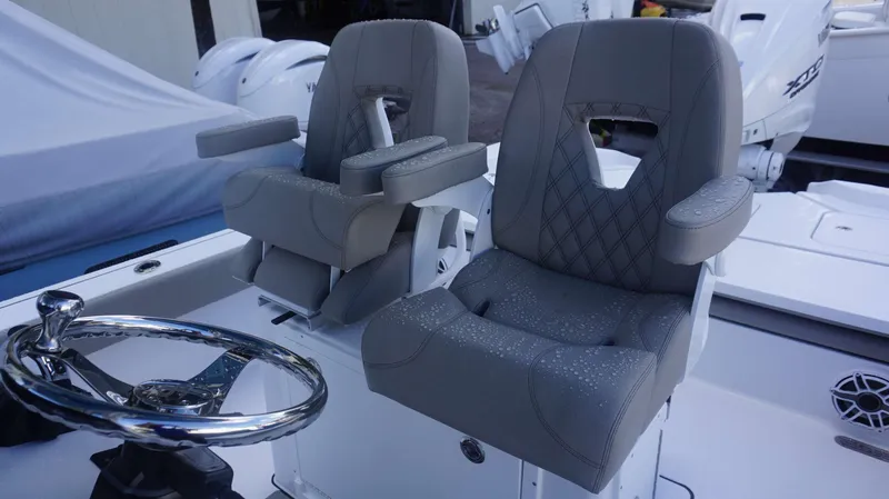 Slide: The Image of Luxury seating on 2025 Sportsman 267 Masters boat, featuring ergonomic design and premium materials. - 19