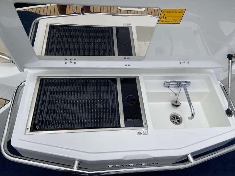 Slide: The Image of Beneteau GT35 2016 model outdoor kitchen with grill and sink. - 39