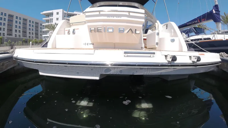 Slide: The Image of 2016 Beneteau GT35 yacht docked at marina, rear view. - 43