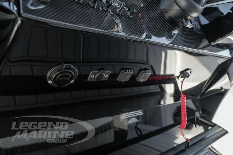 Slide: The Image of Close-up of 2024 Nor-Tech 340 Sport dashboard with controls and safety lanyard. - 18