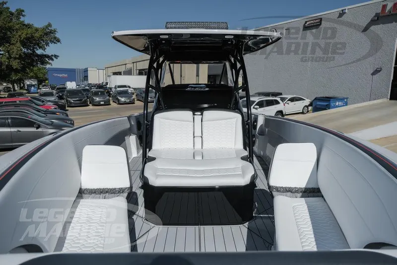 Slide: The Image of 2024 Nor-Tech 340 Sport boat with sleek seating and modern design. - 30