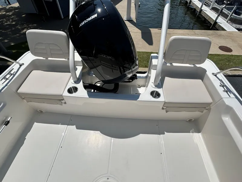 Slide: The Image of 2025 Boston Whaler 190 Montauk boat interior with Mercury outboard motor. - 13