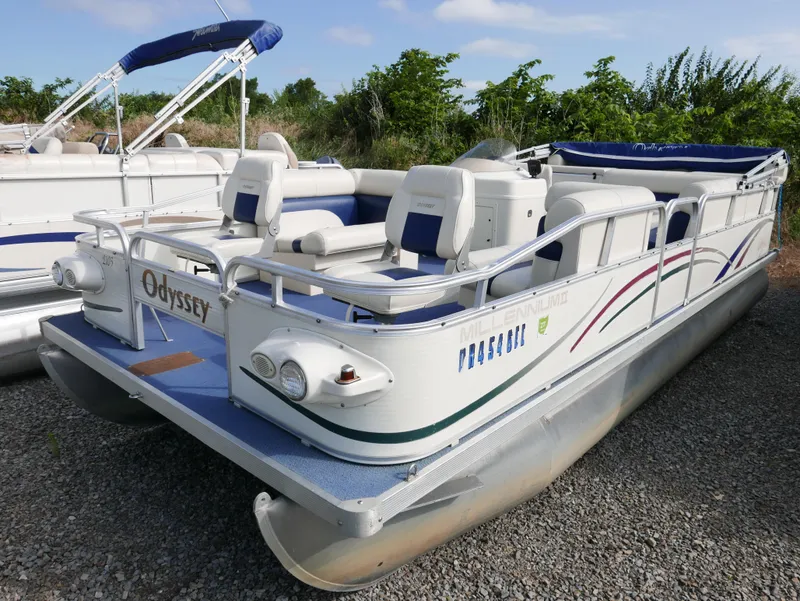 Slide: The Image of 2005 Odyssey Pontoons Millenium 2 pontoon boat with seating and canopy. - 1