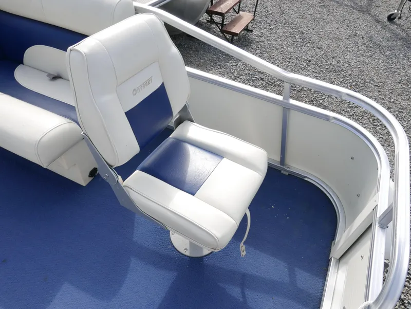 Slide: The Image of 2005 Odyssey Pontoons Millenium 2 boat seat with blue and white upholstery. - 4