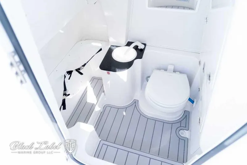Slide: The Image of Interior of 2025 Sea Fox 268 Commander Center Console boat bathroom. - 11