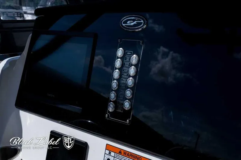 Slide: The Image of 2025 Sea Fox 268 Commander Center Console dashboard with control panel and display. - 15