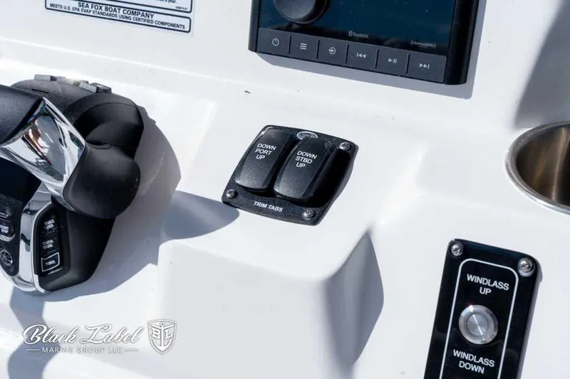 Slide: The Image of Close-up of 2025 Sea Fox 268 Commander Center Console controls. - 18