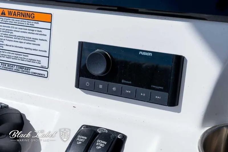 Slide: The Image of Fusion audio system on 2025 Sea Fox 268 Commander Center Console boat dashboard. - 20