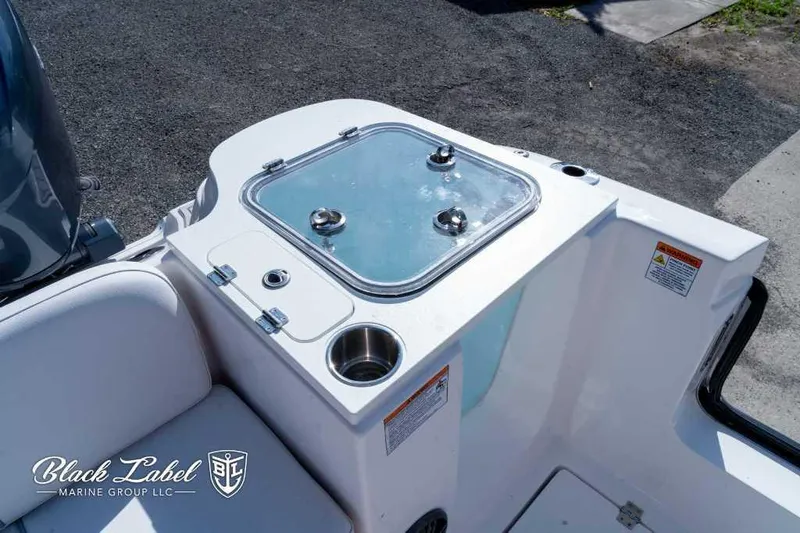 Slide: The Image of 2025 Sea Fox 268 Commander Center Console boat with livewell and seating. - 23