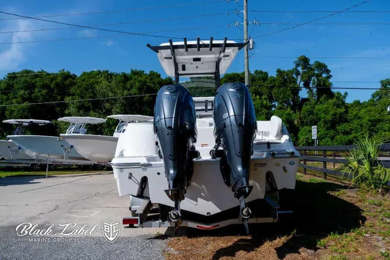 Slide: The Image of 2025 Sea Fox 268 Commander Center Console boat with twin engines at Black Label Marine Group. - 3